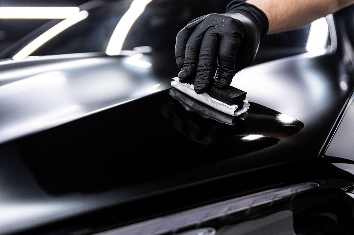 Ceramic coating application on a luxury vehicle for paint protection