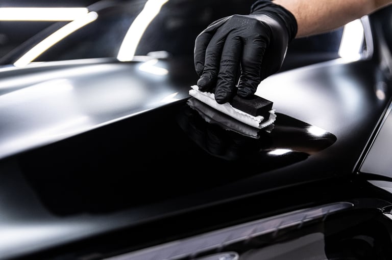 Ceramic coating application on luxury black car
