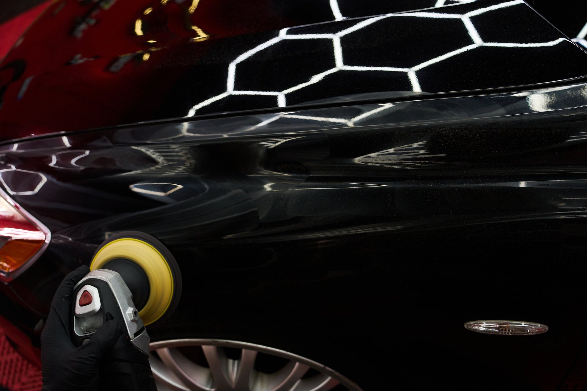 Paint correction and detailing restoring deep gloss