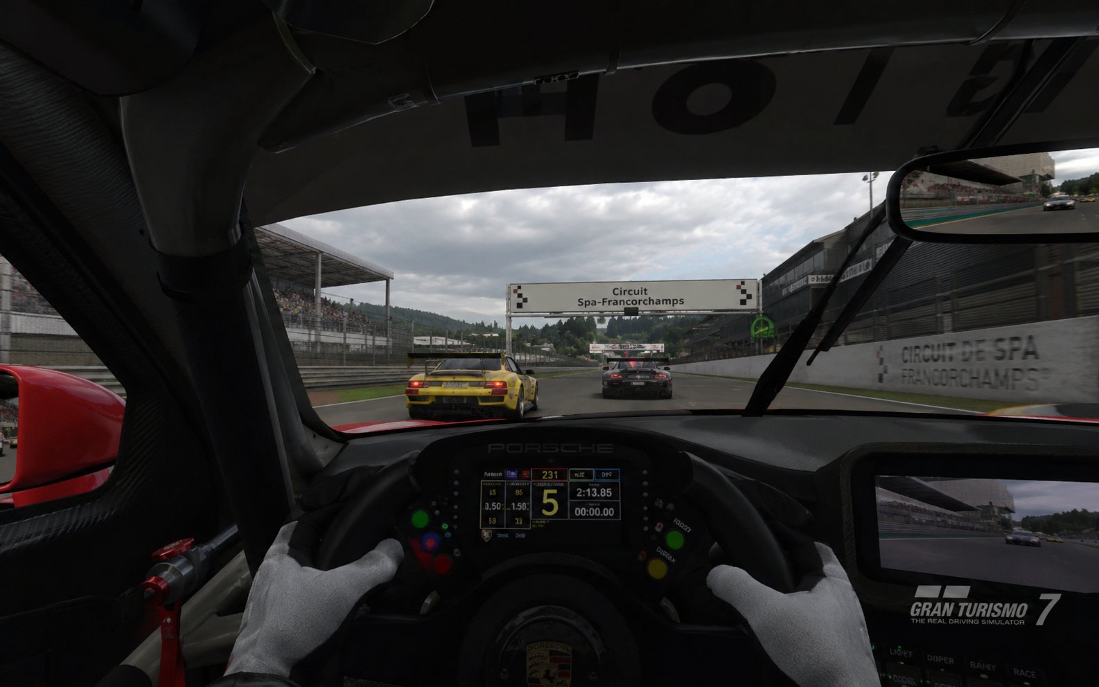 Cockpit view of race car on track during Gran Turismo 7 video game